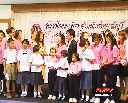 The deserving students receive their scholarships.